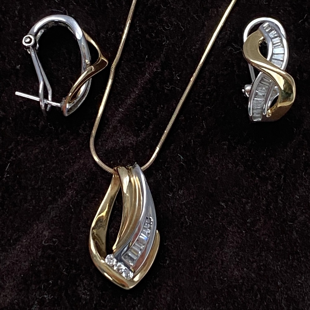 14 k white and yellow gold earrings and necklace set.